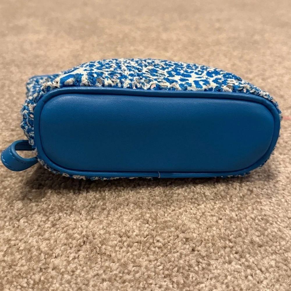 Vera Bradley mesh sequin wristlet on the Camocat blue pattern